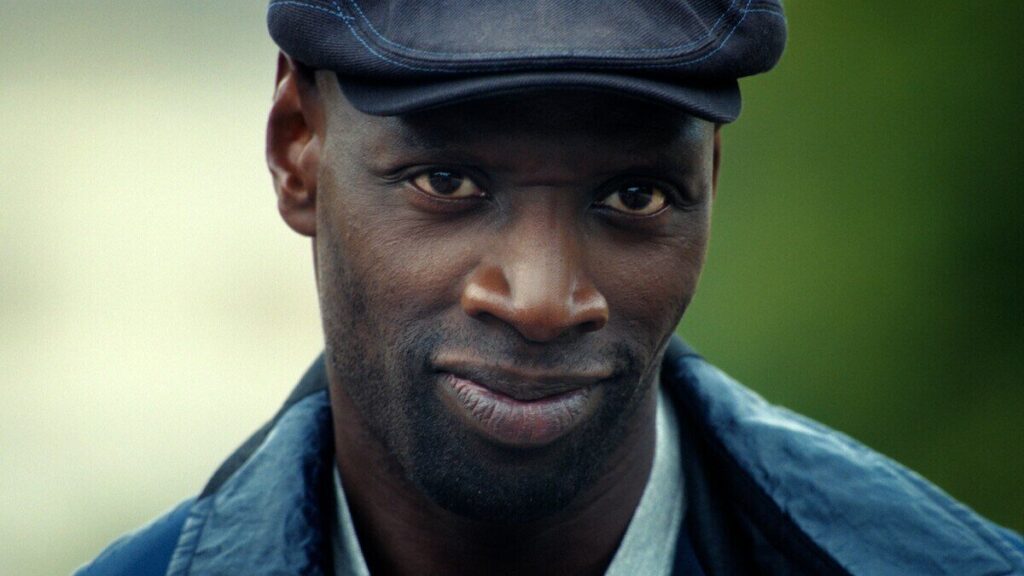 Omar Sy en costume du personnage Assane Diop dans la série Lupin